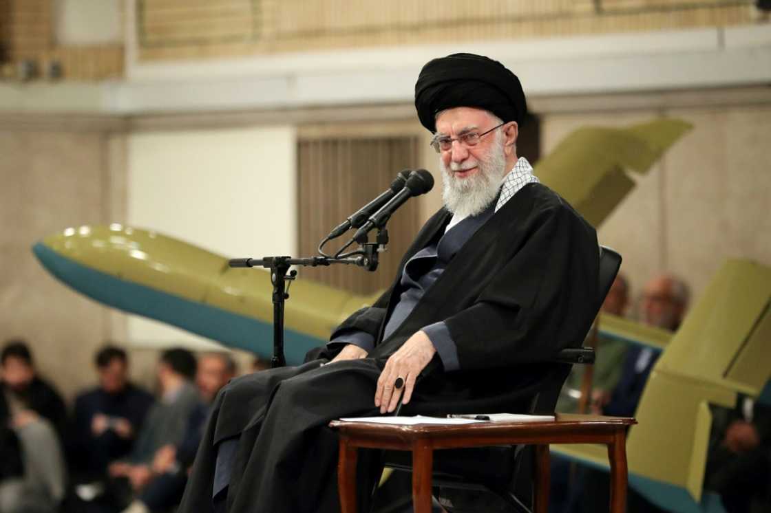 This handout picture provided by the office of Iran's supreme leader Ayatollah Ali Khamenei shows him sitting on stage during a meeting with Iranian air force commanders in Tehran on February 5, 2024