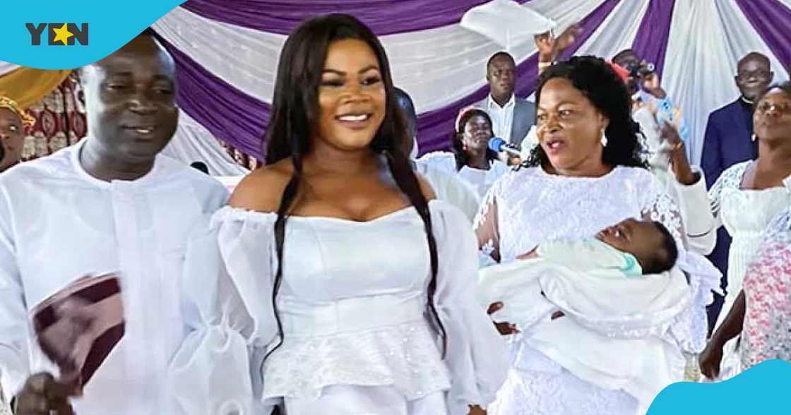 Photo of the couple and a loved one. Photo of the couple and a loved one.