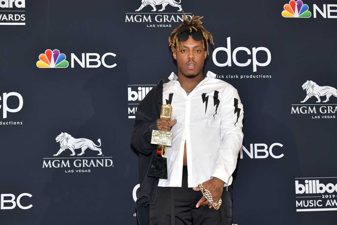 Juice Wrld poses with the award for Best New Artist