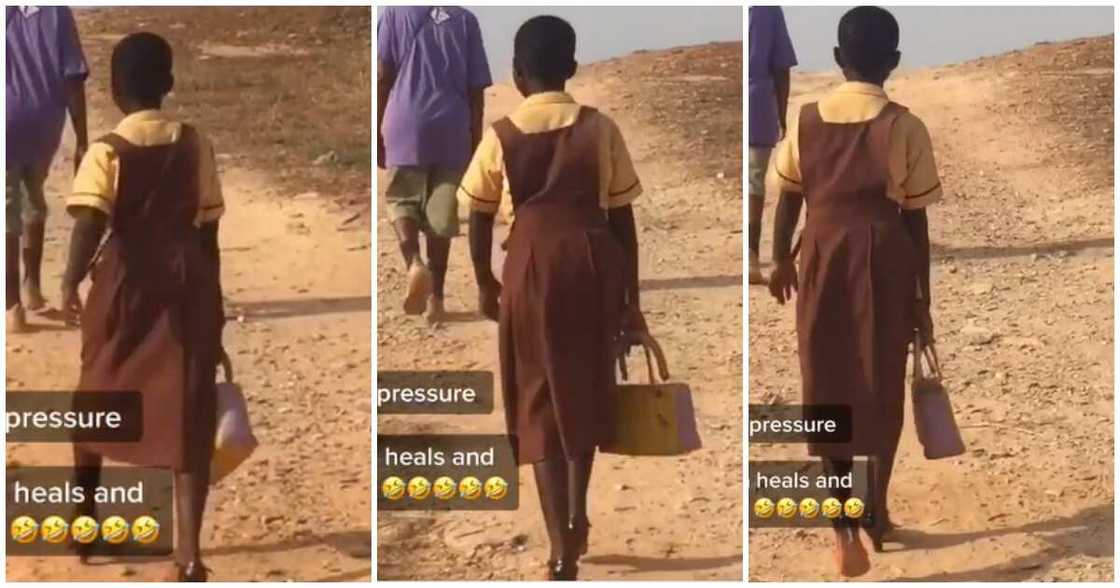 Young girl catwalks to school for Our day Young girl catwalks to school for Our day