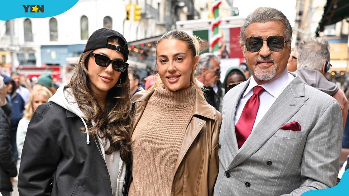 Sistine Stallone (R), Sophia Rose Stallone (C) and Sylvester Stallone (R) pose outdoors. Sistine Stallone (R), Sophia Rose Stallone (C) and Sylvester Stallone (R) pose outdoors.