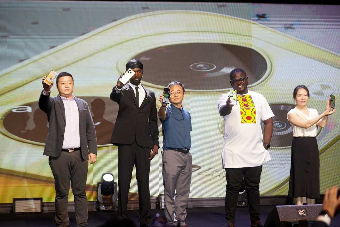 Group picture of Black Sherif with Infinix executives Group picture of Black Sherif with Infinix executives