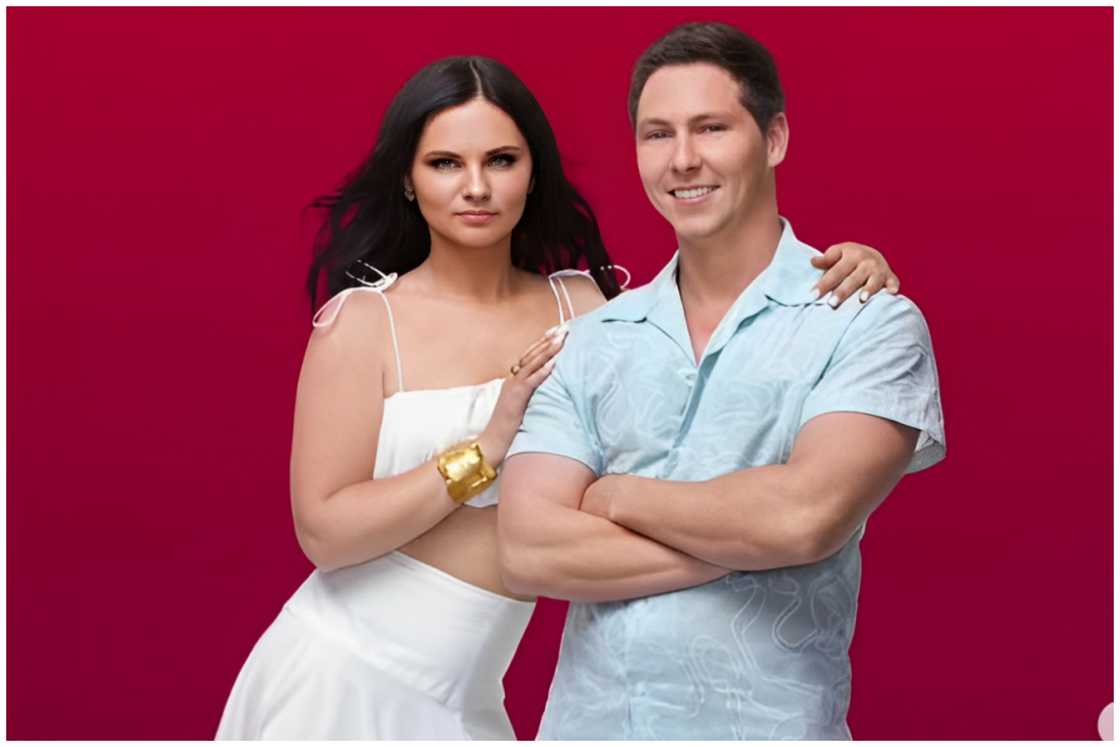 Julia and Brandon standing beside each other during an event.