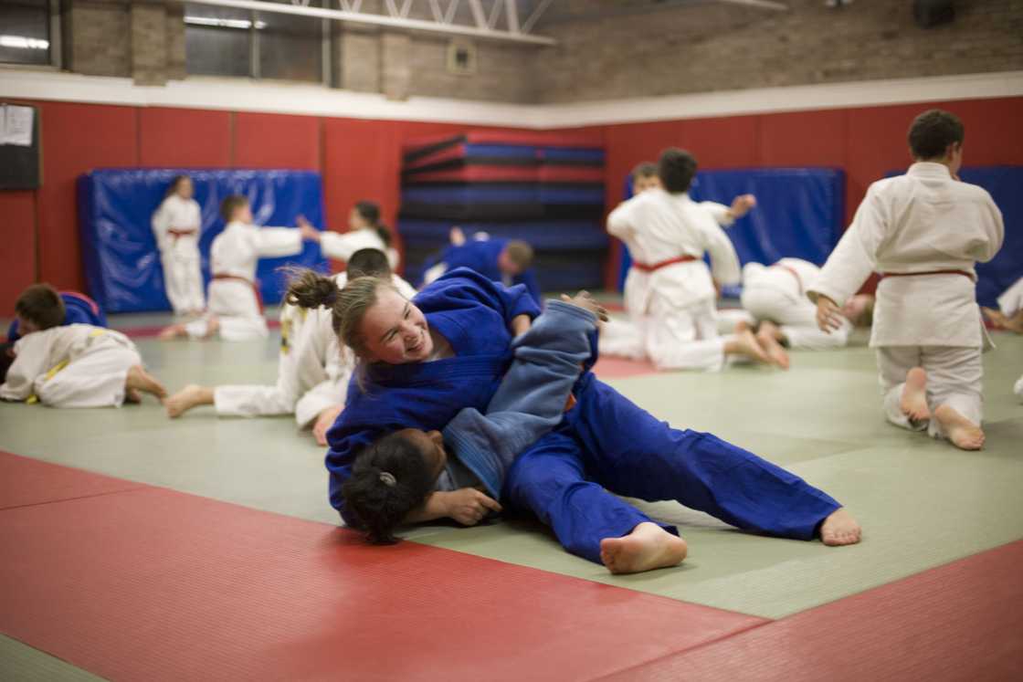 People in a martial arts class People in a martial arts class