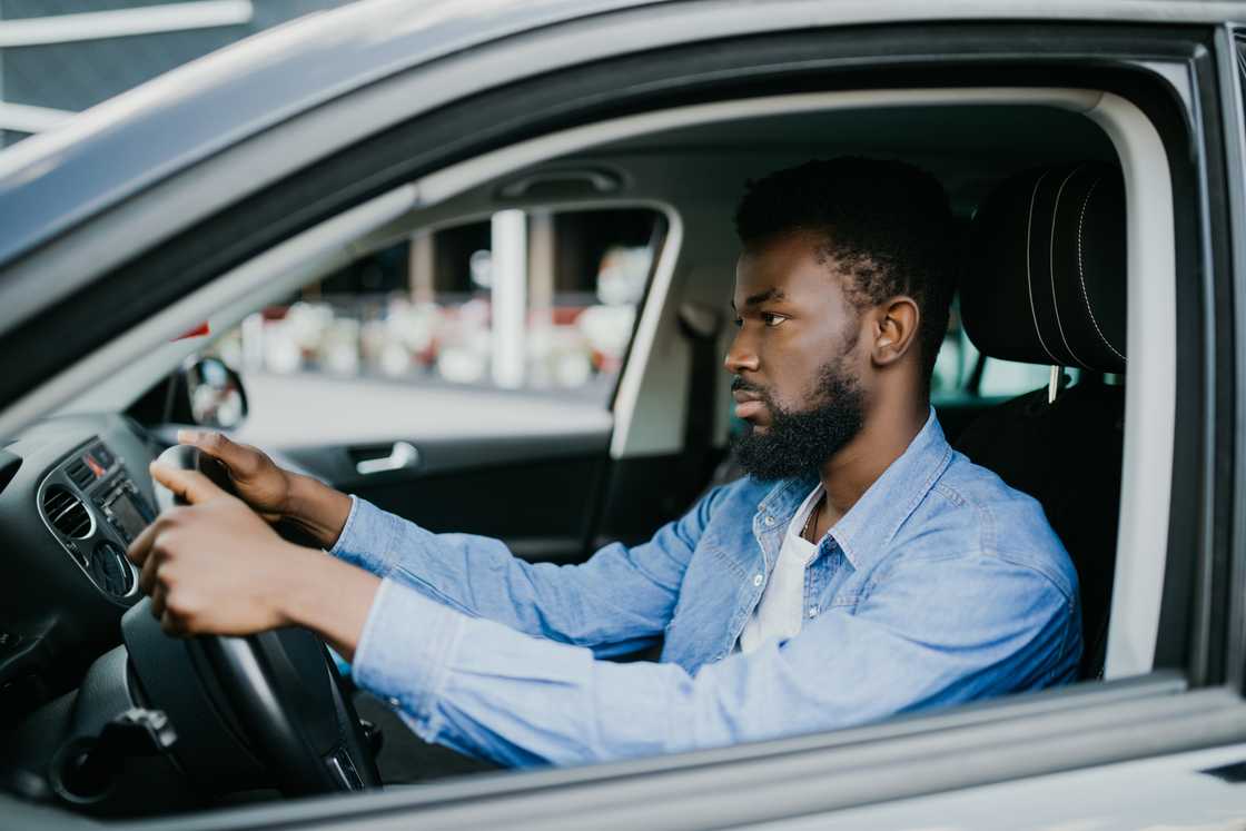 An angry man inside his car