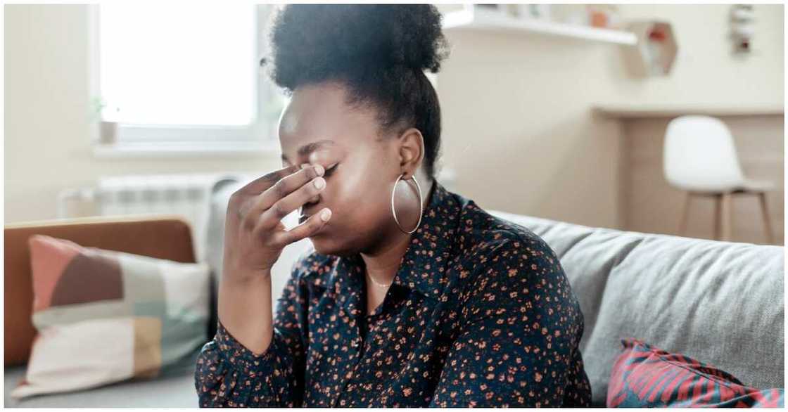 Photo of lady looking depressed and confused