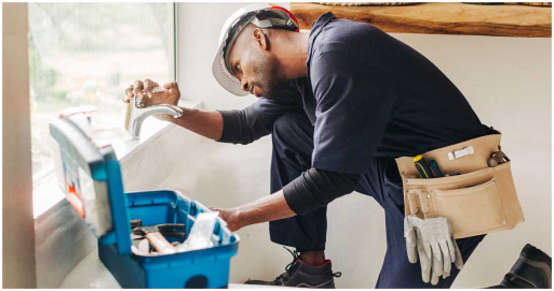 A handyman working around the house