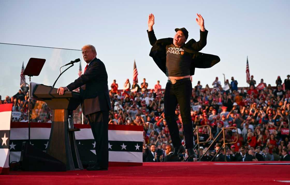 Elon Musk (R), shown joining Donald Trump on stage at a rally in Pennsylvania in October, is poised to have sweeping powers in the Republican's new administration Elon Musk (R), shown joining Donald Trump on stage at a rally in Pennsylvania in October, is poised to have sweeping powers in the Republican's new administration