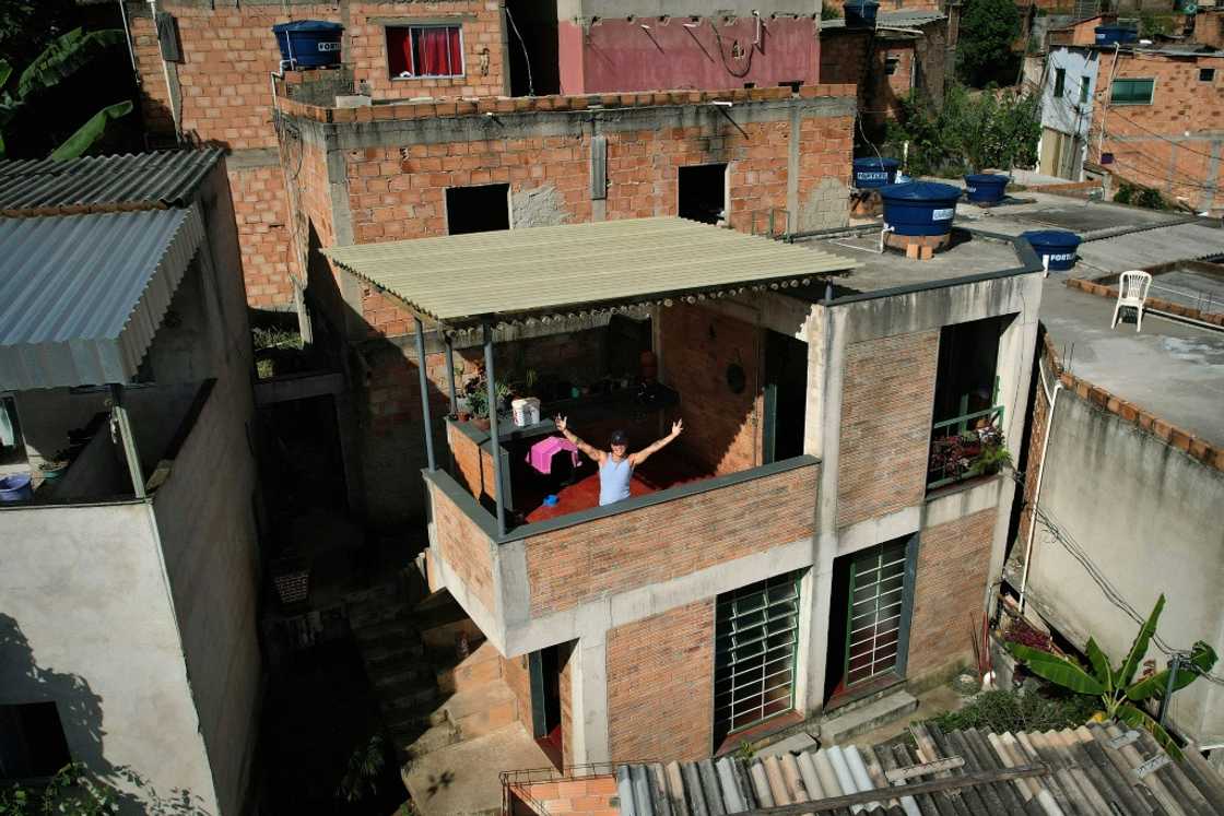 Dos Anjos is seen on the terrace of his prize-winning house in a Brazilian favela on February 24, 2023 Dos Anjos is seen on the terrace of his prize-winning house in a Brazilian favela on February 24, 2023