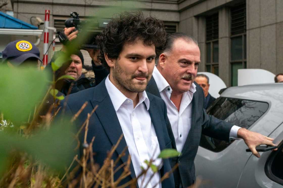 A US agency said it won a court order for a $12.7 billion judgment against FTX and affiliate in the wake of the scandal involving former chief Sam Bankman-Fried, shown in December 2022 A US agency said it won a court order for a $12.7 billion judgment against FTX and affiliate in the wake of the scandal involving former chief Sam Bankman-Fried, shown in December 2022