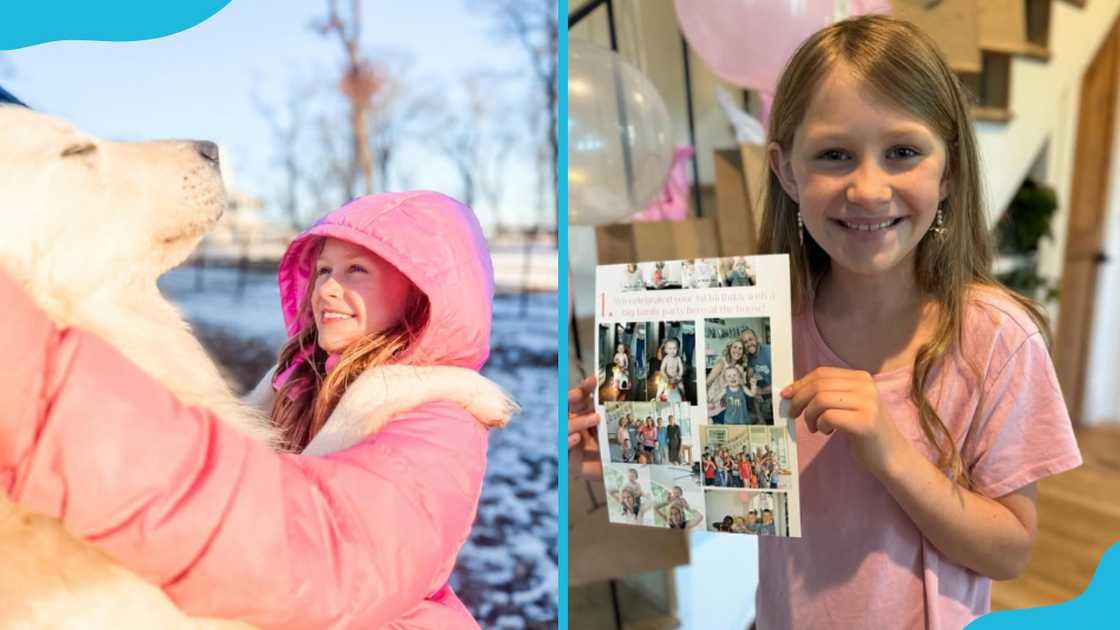 Charlotte with a dog and holding a card Charlotte with a dog and holding a card