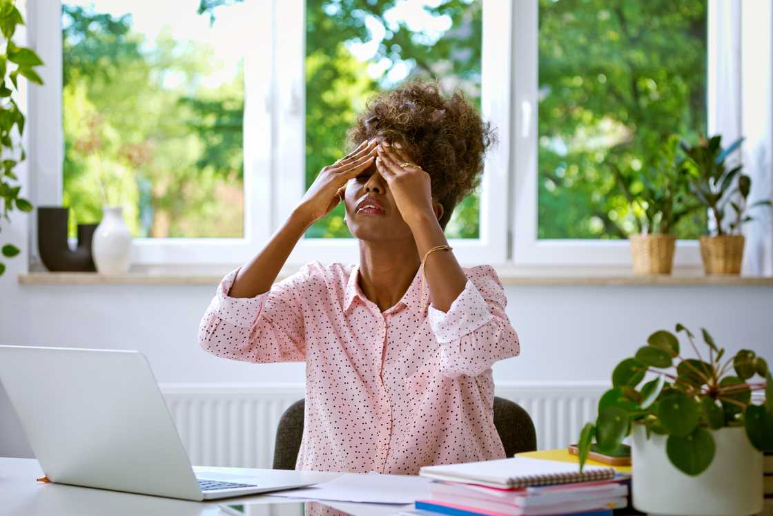 A frustrated woman in an office A frustrated woman in an office