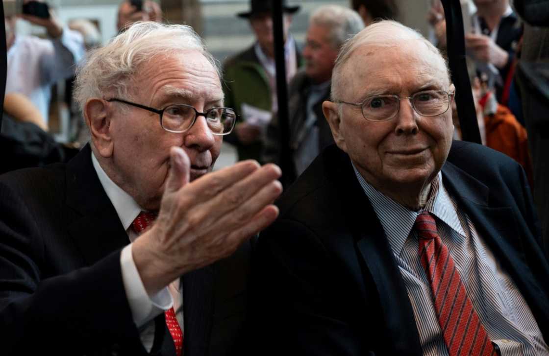 Warren Buffett (L) ran Berkshire Hathaway with long-time business partner Charlie Munger -- the pair are seen here in 2019 Warren Buffett (L) ran Berkshire Hathaway with long-time business partner Charlie Munger -- the pair are seen here in 2019