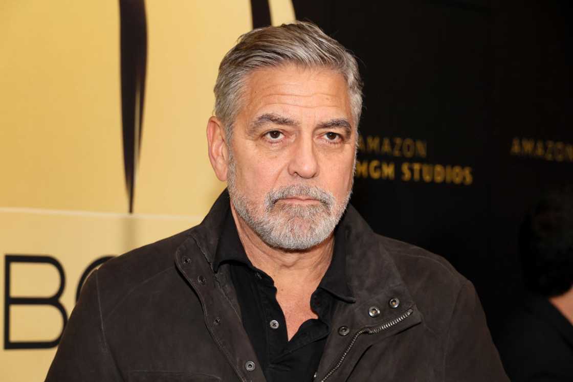 George Clooney in a black tee and jacket