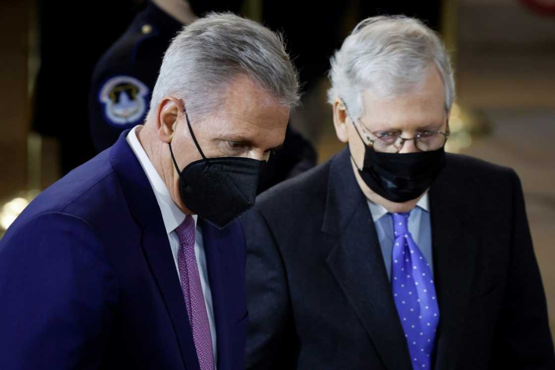 House Republican Leader Kevin McCarthy  (left) Senate Republican Leader Mitch McConnell, seen together in January 2022, have set different tones on assisting Ukraine