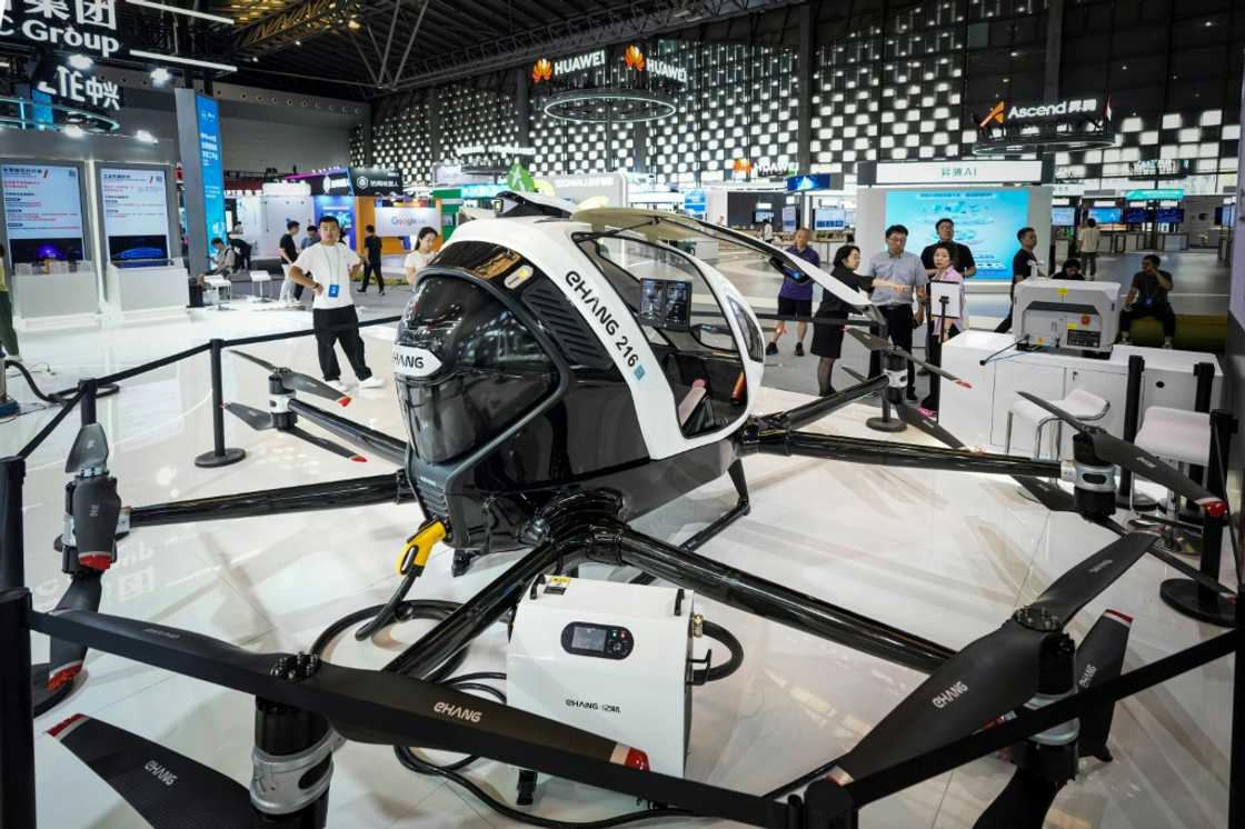 A passenger-carrying electric unmanned aerial vehicle on display in Shanghai A passenger-carrying electric unmanned aerial vehicle on display in Shanghai