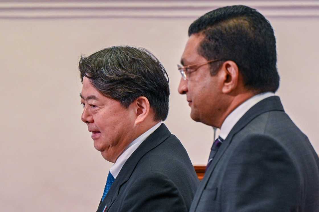 Japan pressed bankrupt Sri Lanka on Saturday to expedite its debt restructuring, including with its biggest creditor China