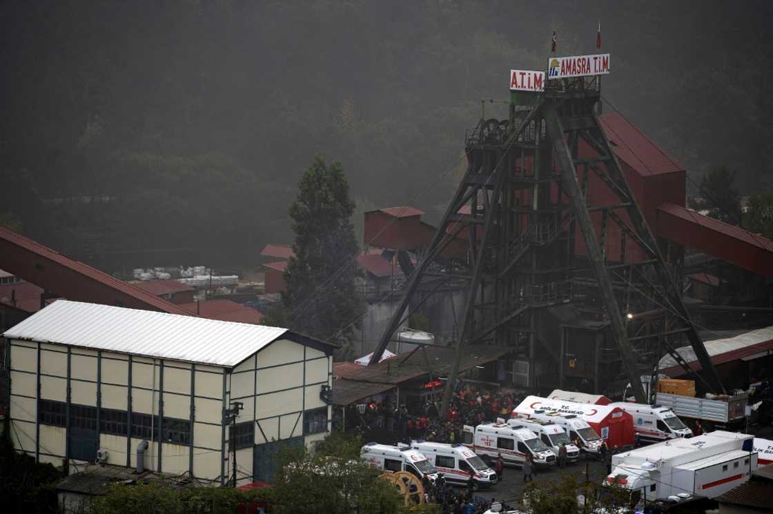 A photograph shows an outside view of the coal mine after an explosion in Amasra, in Bartin Province, Turkey, on October 15, 2022. Rescuers desperately searched for signs of life on October 15, 2022 after a methane blast at a coal mine in northern Turkey killed at least 28 people and trapped dozens of others hundreds of metres underground. A photograph shows an outside view of the coal mine after an explosion in Amasra, in Bartin Province, Turkey, on October 15, 2022. Rescuers desperately searched for signs of life on October 15, 2022 after a methane blast at a coal mine in northern Turkey killed at least 28 people and trapped dozens of others hundreds of metres underground.