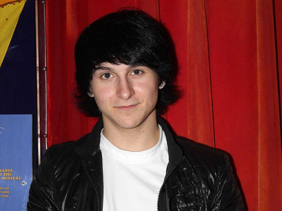 Mitchel Musso in a white t-shirt and black jacket Mitchel Musso in a white t-shirt and black jacket