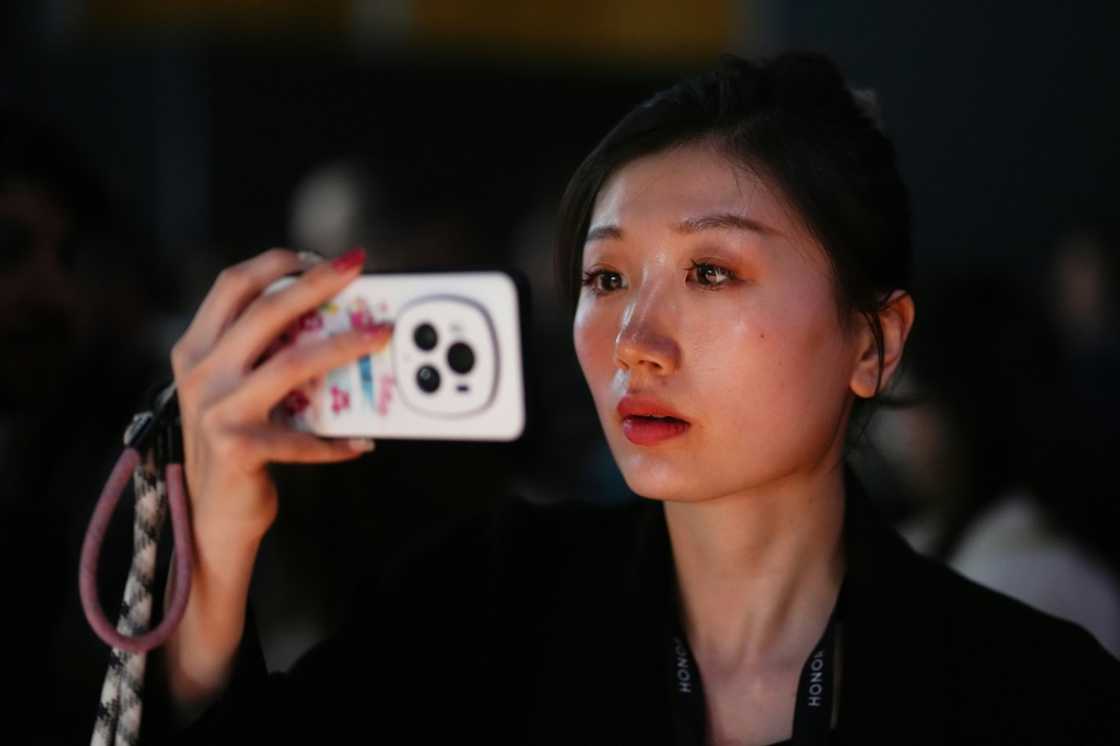 The focus on AI comes amid sluggish smartphones sales as consumers are taking longer to upgrade their devices The focus on AI comes amid sluggish smartphones sales as consumers are taking longer to upgrade their devices
