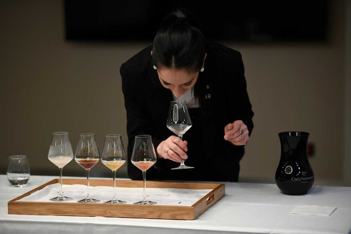 Candidate Valeria Gamper of Argentina takes part in a cocktail-tasting trial at the championships Candidate Valeria Gamper of Argentina takes part in a cocktail-tasting trial at the championships