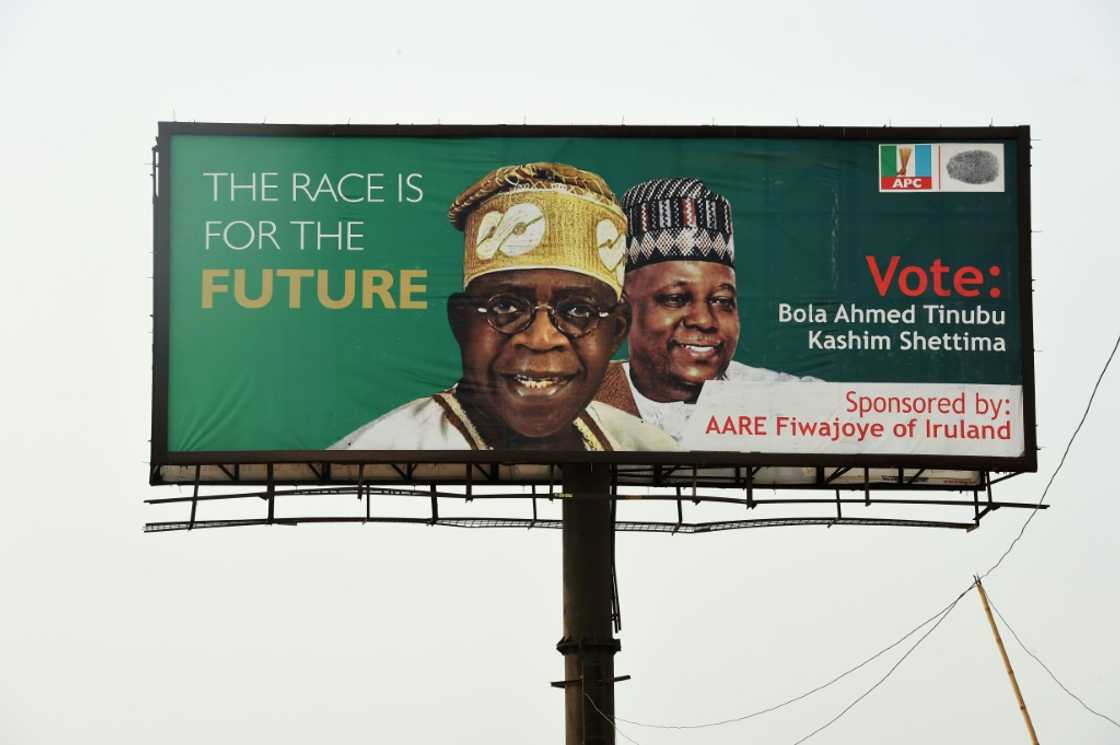 Ruling APC party candidate Bola Tinubu, seen here on a campaign poster, says the fuel and cash crisis is a bid to undermine him Ruling APC party candidate Bola Tinubu, seen here on a campaign poster, says the fuel and cash crisis is a bid to undermine him
