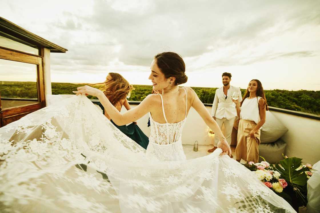 A shot of the bride dancing with friends