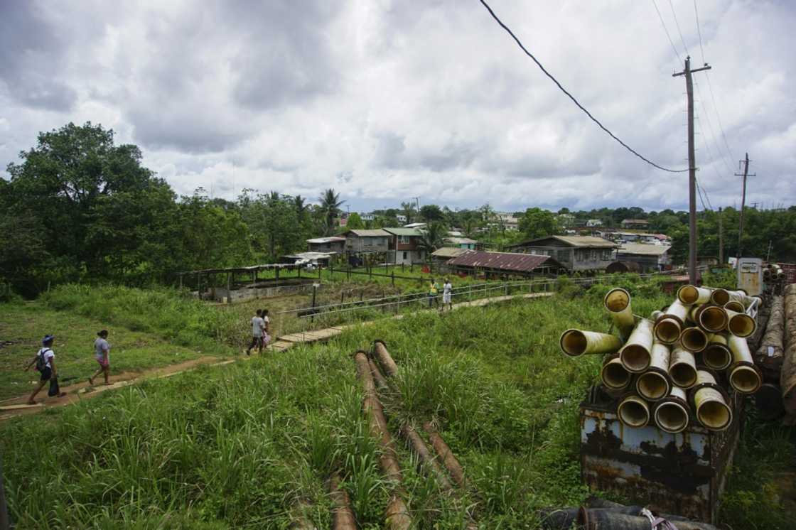 Local economists say the projected $10 billion Suriname stands to make will likely bring economic growth at the cost of the local environment and global emissions goals Local economists say the projected $10 billion Suriname stands to make will likely bring economic growth at the cost of the local environment and global emissions goals