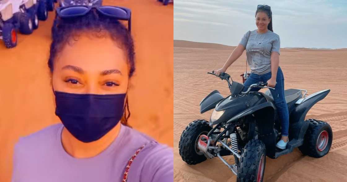 Nadia Buari riding a four-wheeled bike