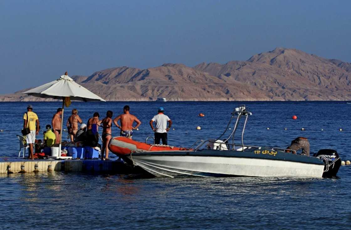 Tourists pictured in 2015 boarding a boat near Tiran, an island that is un-inhabited, except for peacekeepers Tourists pictured in 2015 boarding a boat near Tiran, an island that is un-inhabited, except for peacekeepers