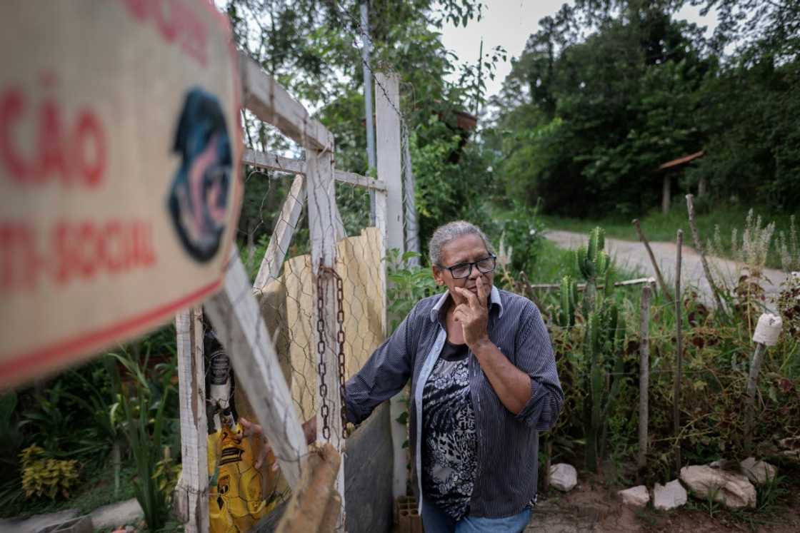 Joaquina de Oliveira is among the few residents still living in the devastated neighborhood of Parque da Cachoeira Joaquina de Oliveira is among the few residents still living in the devastated neighborhood of Parque da Cachoeira