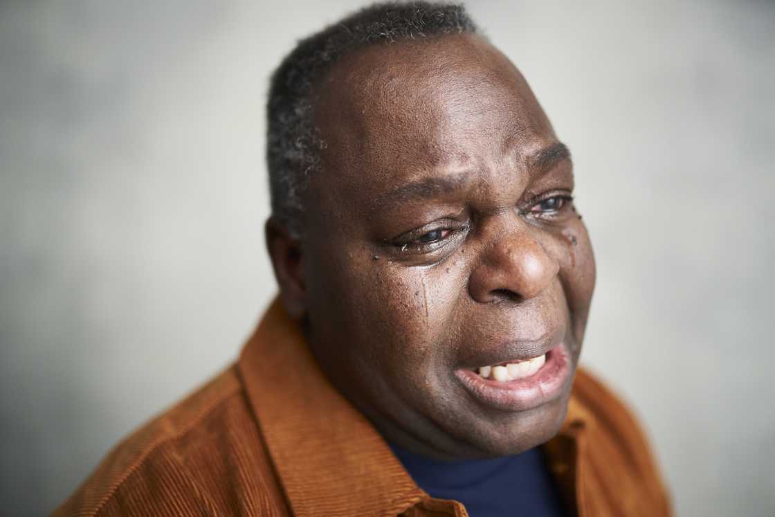 A man is crying A man is crying