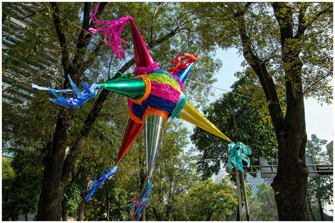 Christmas piñata hanging above Paseo de la Reforma in Mexico City, Mexico