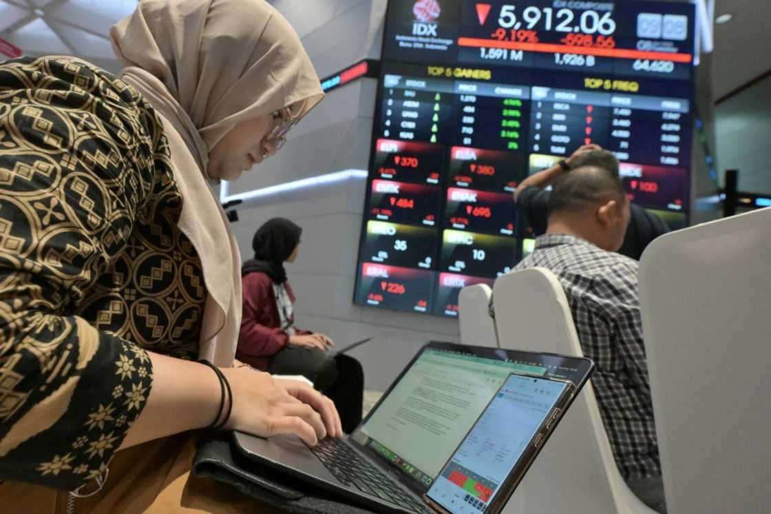 The benchmark Jakarta Composite Index fell 9.19 percent at the open The benchmark Jakarta Composite Index fell 9.19 percent at the open