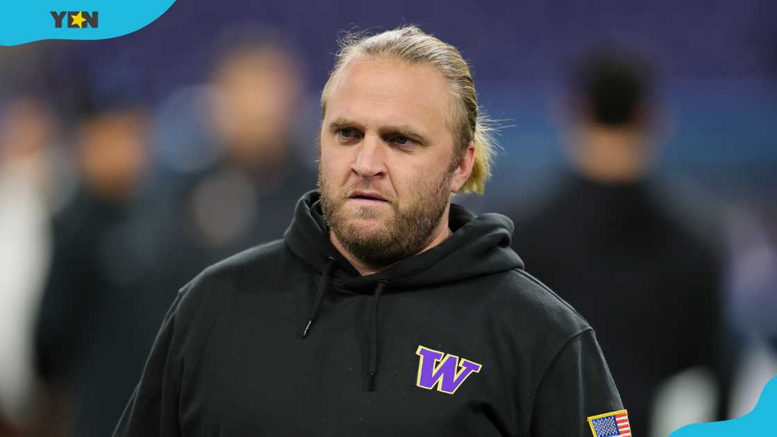 Defensive coordinator Steve Belichick of the Washington Huskies looks on before a game. Defensive coordinator Steve Belichick of the Washington Huskies looks on before a game.