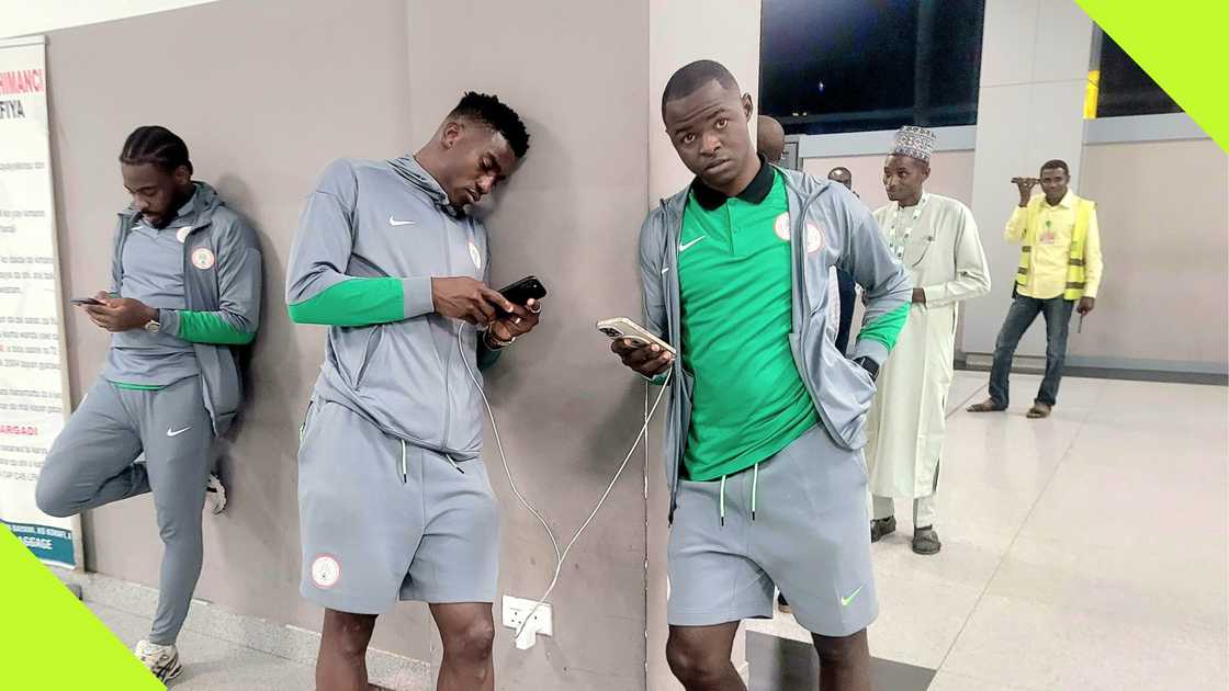 Super Eagles players look dejected after arriving in Nigeria from Libya.