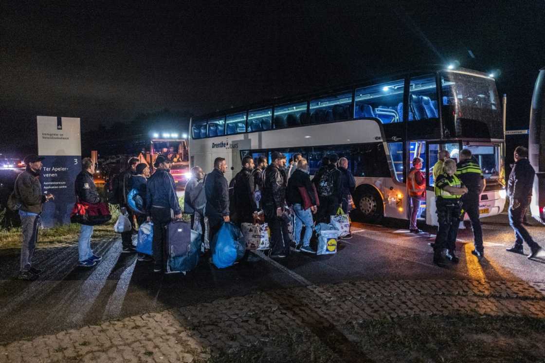 The Dutch government says   hundreds of asylum-seekers have been were bussed from the overcrowded and crisis-hit Ter Apel migrant centre