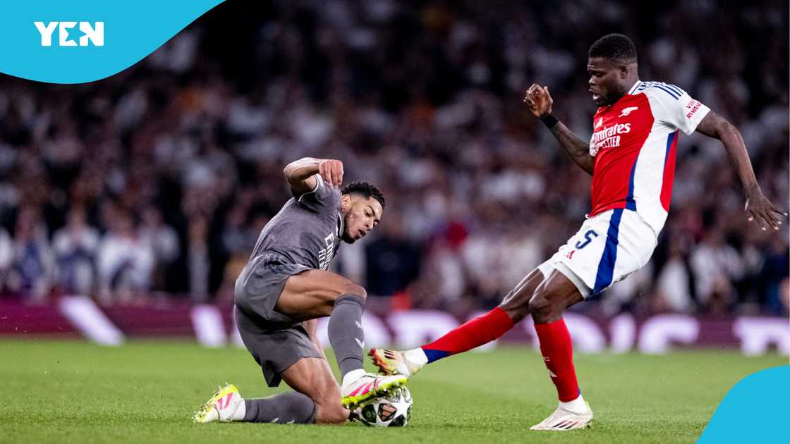 Jude Bellingham engaged in a midfield battle with Thomas Partey. Jude Bellingham engaged in a midfield battle with Thomas Partey.
