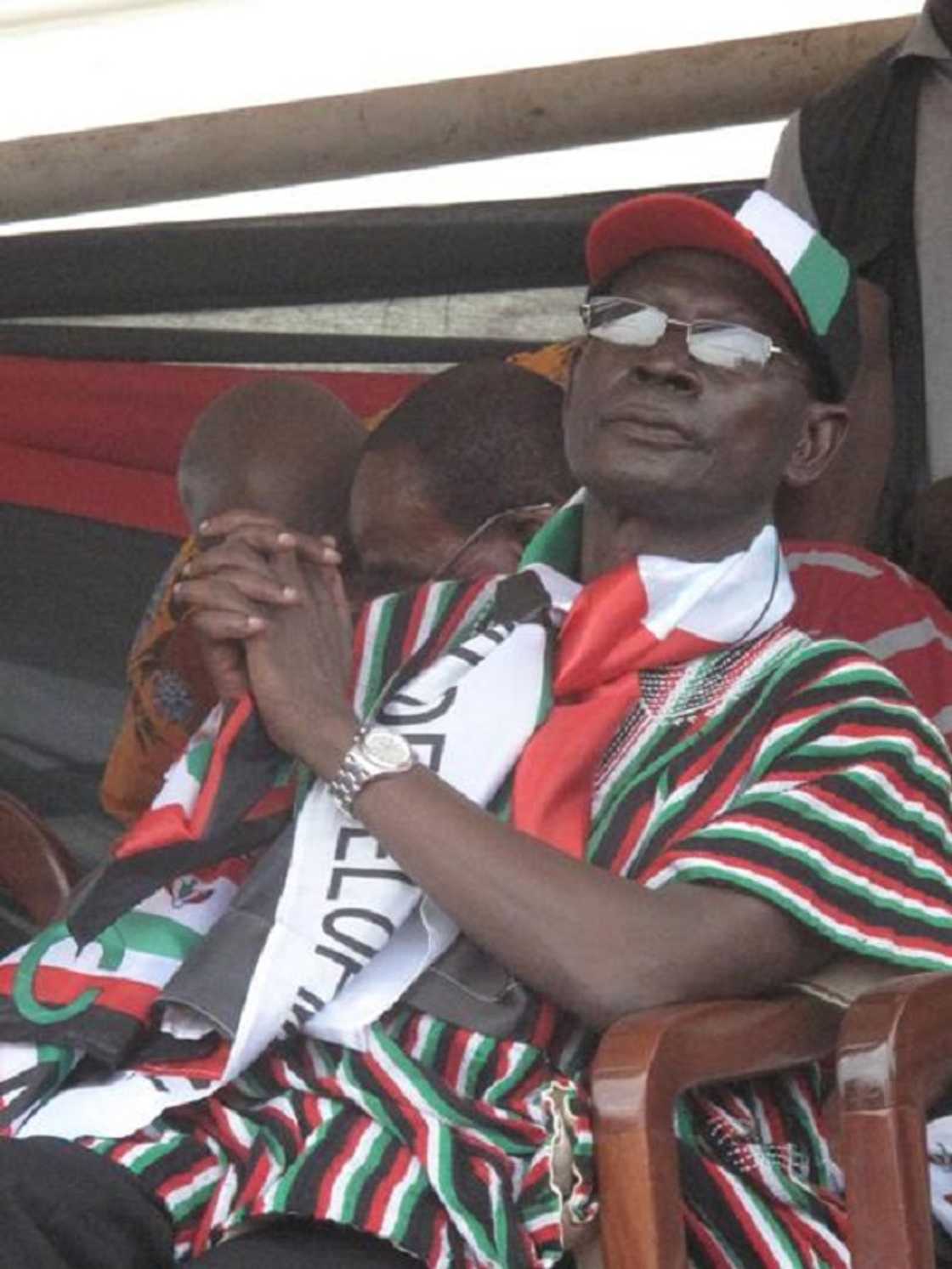 A man seated in a chair A man seated in a chair