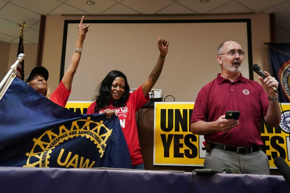 United Auto Workers (UAW) President Shawn Fain, right, shown here at the celebration of a win Tennessee last month, hopes for a succeessful outcome at an election in Alabama