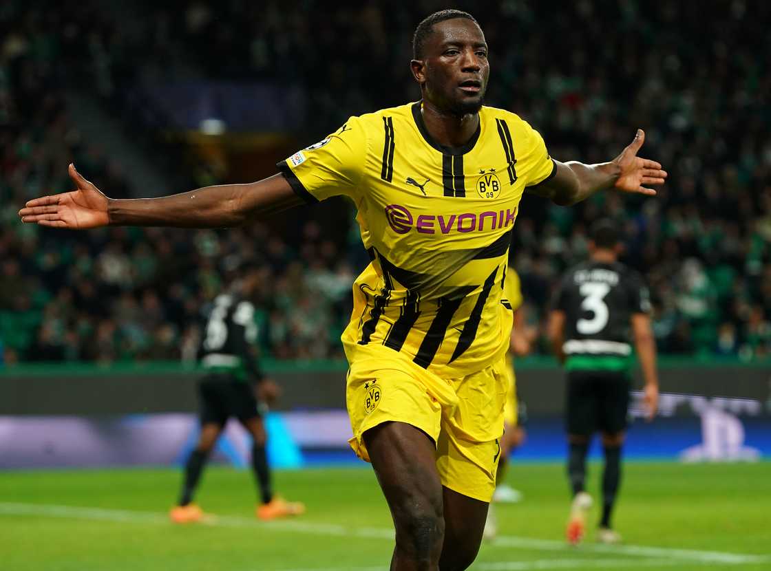 Serhou Guirassy of Borussia Dortmund celebrates after scoring a goal during the UEFA Champions League 2024/25 League Knockout Play-off First Leg match between Sporting CP and Borussia Dortmund on February 11, 2025 in Lisbon, Portugal Serhou Guirassy of Borussia Dortmund celebrates after scoring a goal during the UEFA Champions League 2024/25 League Knockout Play-off First Leg match between Sporting CP and Borussia Dortmund on February 11, 2025 in Lisbon, Portugal