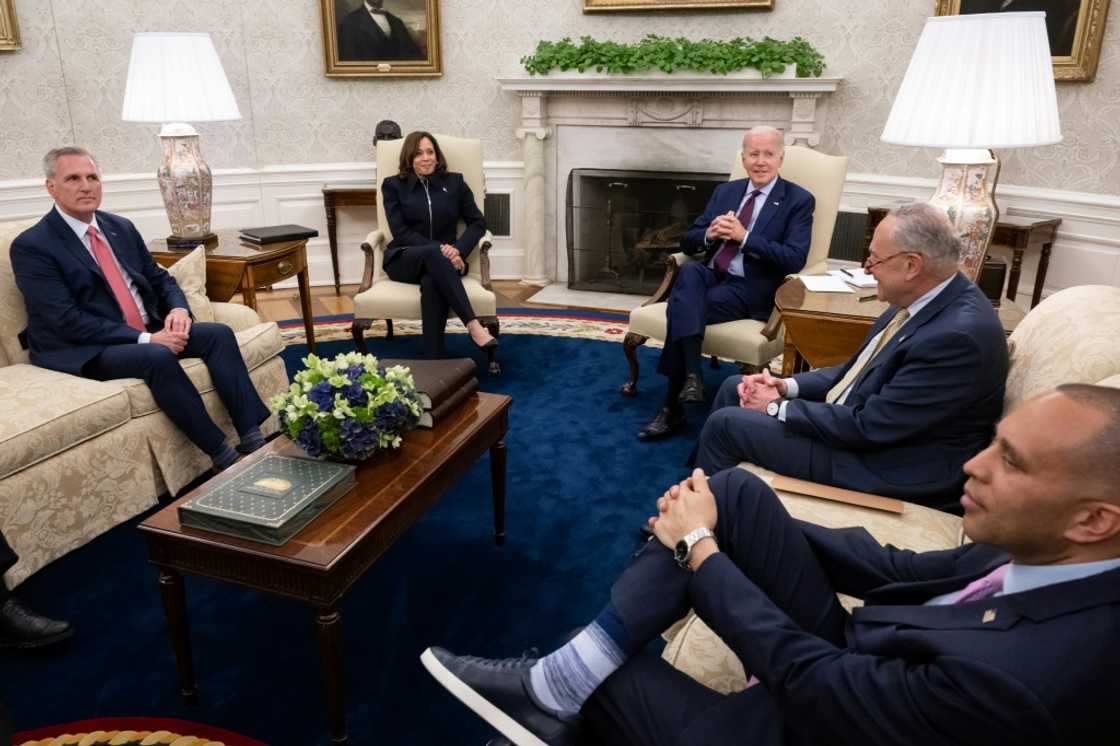 US President Joe Biden speaks during a meeting on the debt limit with US House Speaker Kevin McCarthy, US Vice President Kamala Harris, Senate Majority Leader Chuck Schumer and House Minority Leader Hakeem Jeffries in the Oval Office May 16, 2023 US President Joe Biden speaks during a meeting on the debt limit with US House Speaker Kevin McCarthy, US Vice President Kamala Harris, Senate Majority Leader Chuck Schumer and House Minority Leader Hakeem Jeffries in the Oval Office May 16, 2023