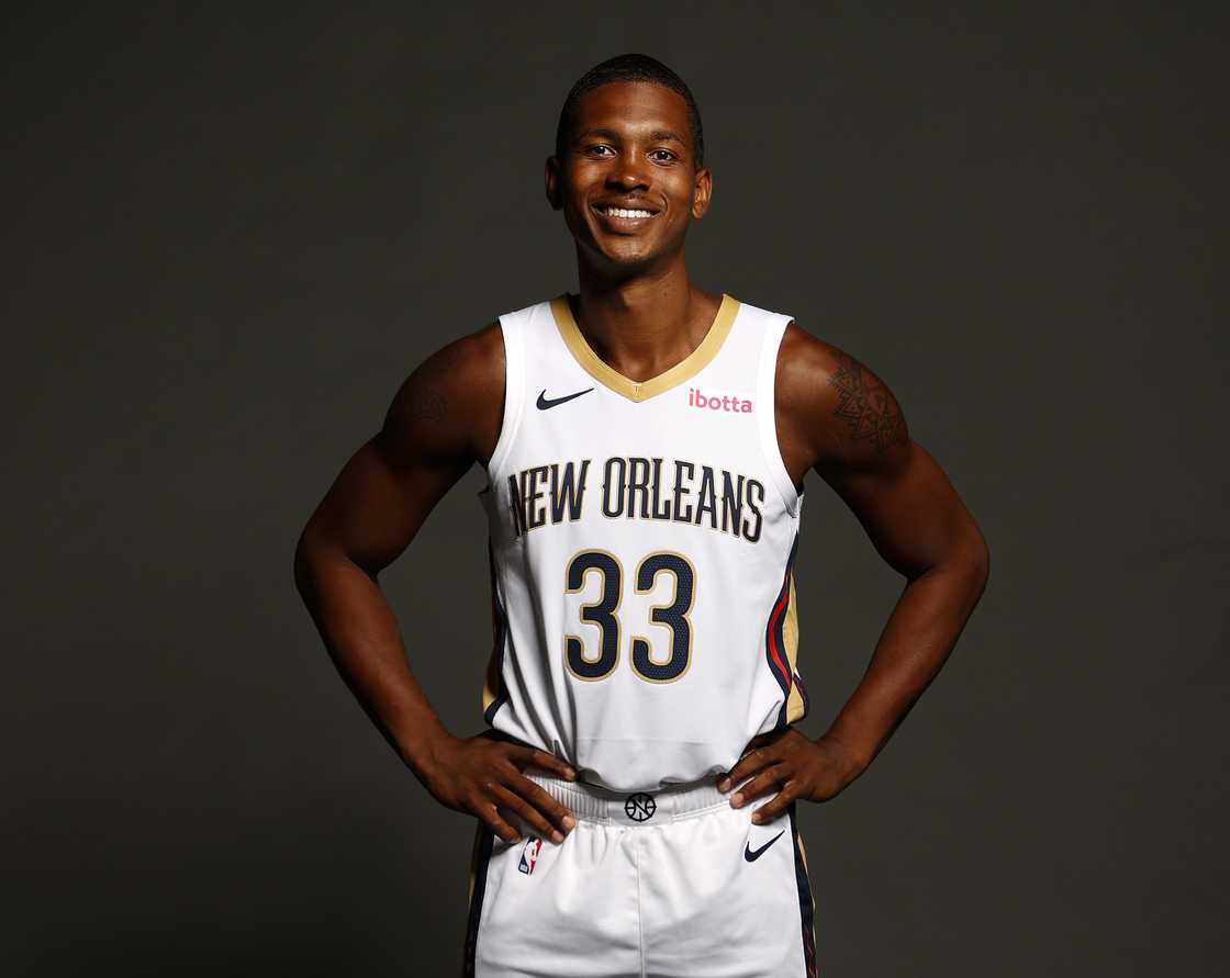 Malcolm Hill poses for a photo during media day at Smoothie King Center Malcolm Hill poses for a photo during media day at Smoothie King Center