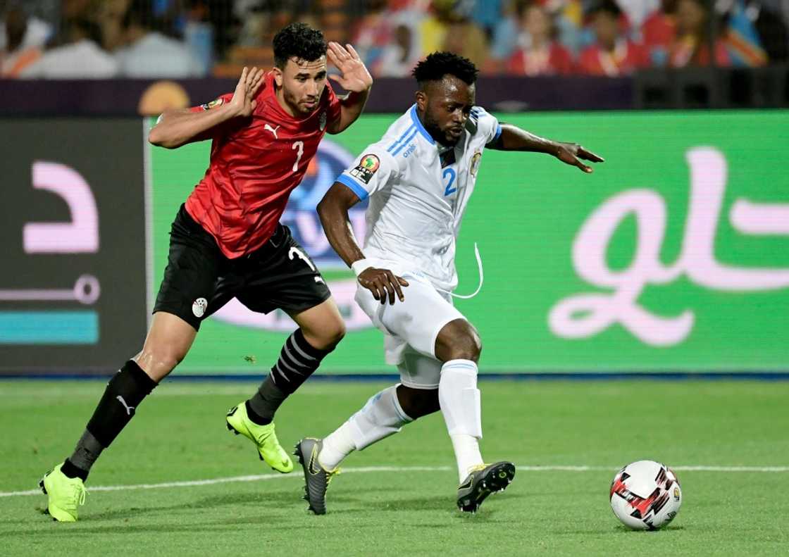 Issama Mpeko (R) is a stalwart in the defence of CAF Confederation Cup contenders TP Mazembe Issama Mpeko (R) is a stalwart in the defence of CAF Confederation Cup contenders TP Mazembe