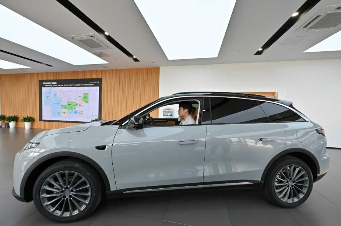 The European Parliament is expected to vote Friday on whether to impose tariffs on EVs from China, while the United States has sought to stop a flood of cheap Chinese electric cars from flooding its markets The European Parliament is expected to vote Friday on whether to impose tariffs on EVs from China, while the United States has sought to stop a flood of cheap Chinese electric cars from flooding its markets