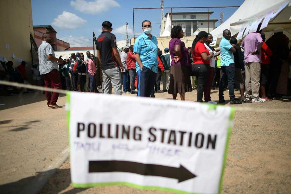Voters queue at a polling station in Eldoret, the stomping ground of presidential candidate William Ruto Voters queue at a polling station in Eldoret, the stomping ground of presidential candidate William Ruto