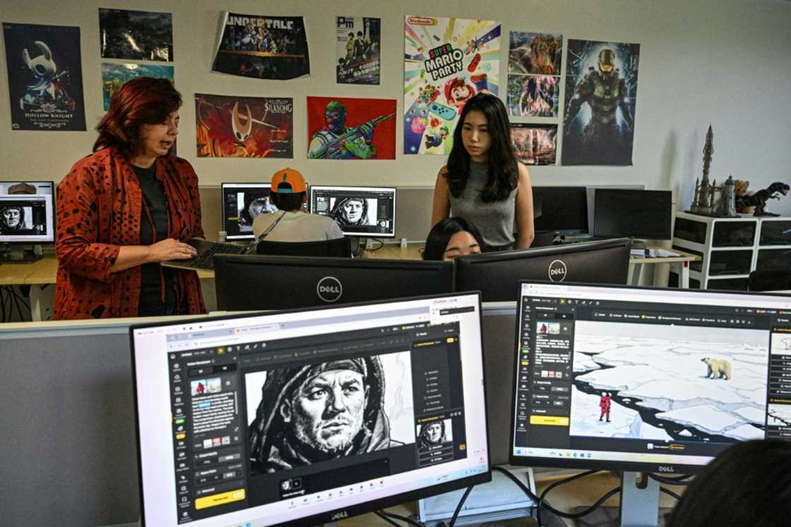 Odet Abadia (L) teaching students to use Dzine, an AI image editing platform, at an AI filmmaking course at the Shanghai Vancouver Film School Odet Abadia (L) teaching students to use Dzine, an AI image editing platform, at an AI filmmaking course at the Shanghai Vancouver Film School