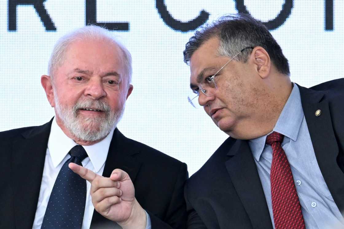 Brazilian President Luiz Inacio Lula da Silva (L) and Justice Minister Flavio Dino (R) Brazilian President Luiz Inacio Lula da Silva (L) and Justice Minister Flavio Dino (R)