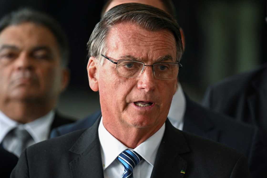 Brazilian President Jair Bolsonaro makes a statement for the first time following the country's runoff election, at Alvorada Palace in Brasilia on November 1, 2022 Brazilian President Jair Bolsonaro makes a statement for the first time following the country's runoff election, at Alvorada Palace in Brasilia on November 1, 2022