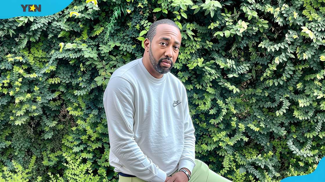 Larry Hoover, Jr. poses for a photo